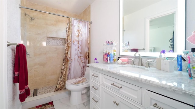 bathroom with a shower with curtain, vanity, and toilet