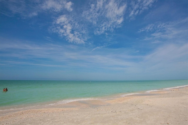 view of water feature with a beach view