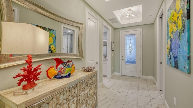 entrance foyer with an inviting chandelier