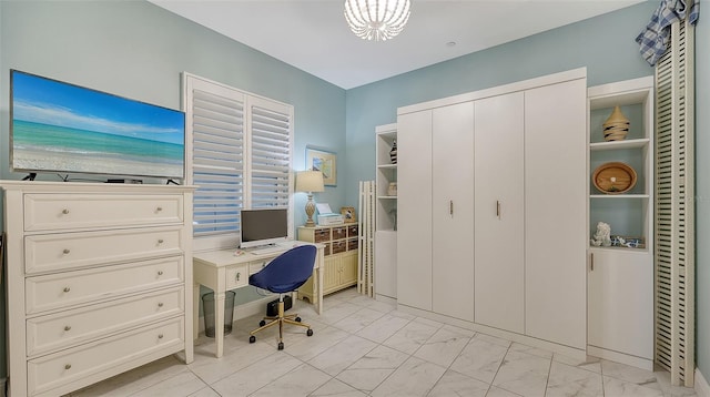 home office with an inviting chandelier