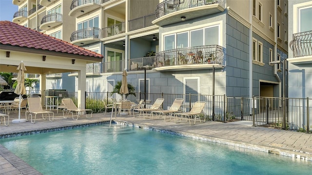 view of swimming pool featuring a patio