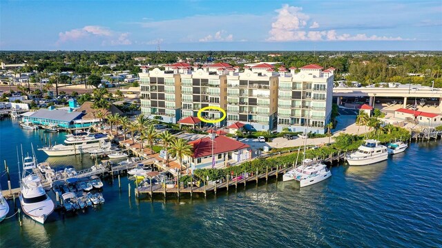 birds eye view of property featuring a water view