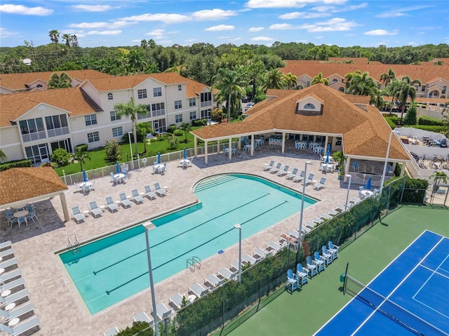 view of swimming pool with a patio area