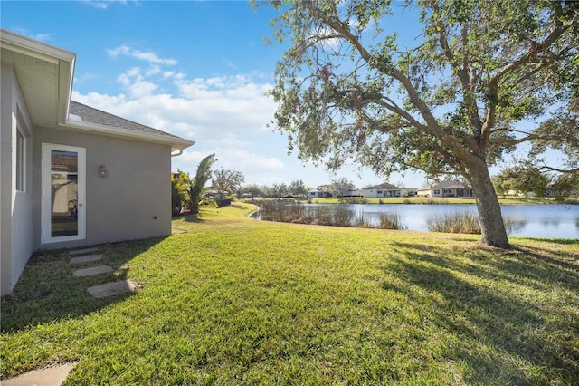 view of yard featuring a water view