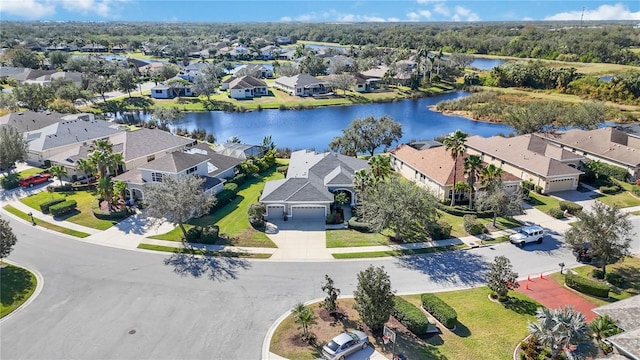 bird's eye view with a water view