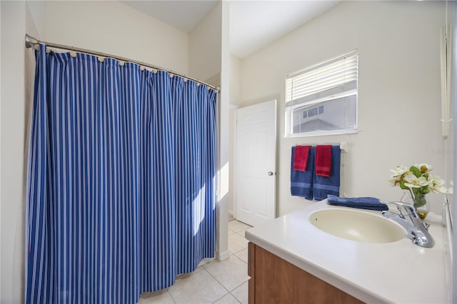 full bath featuring tile patterned floors, vanity, and a shower with curtain