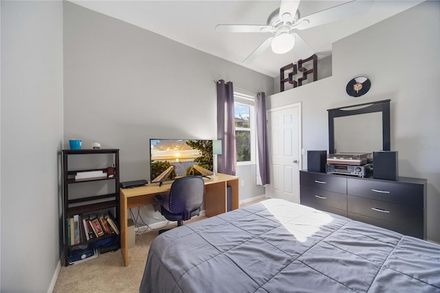 bedroom with carpet flooring, ceiling fan, and baseboards