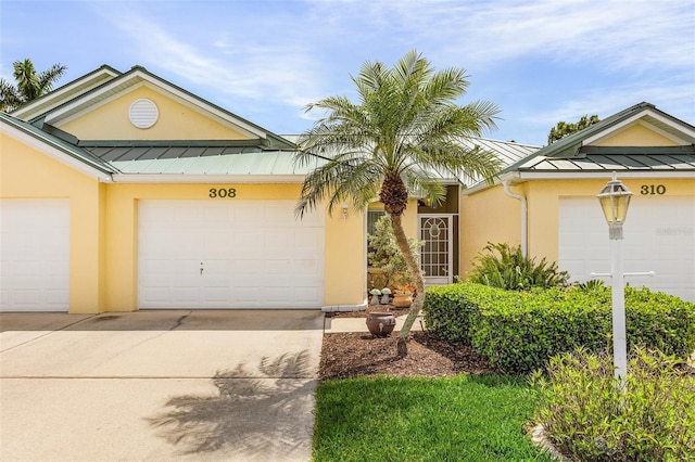 single story home with a garage