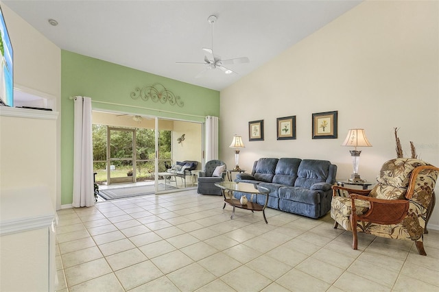 living room featuring high vaulted ceiling, ceiling fan, and light tile patterned floors