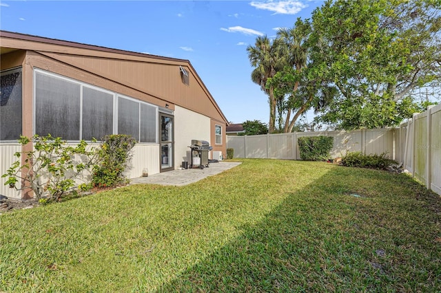 view of yard featuring a fenced backyard and a patio