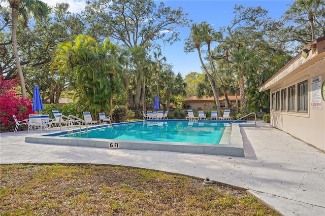 pool featuring a patio area