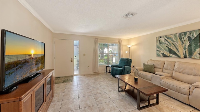 tiled living room featuring a textured ceiling and ornamental molding