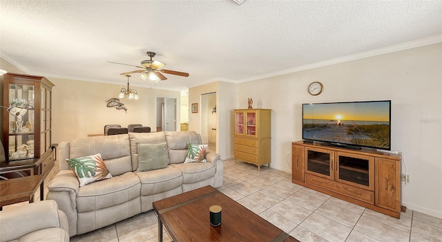 living room featuring a textured ceiling, ceiling fan, and ornamental molding