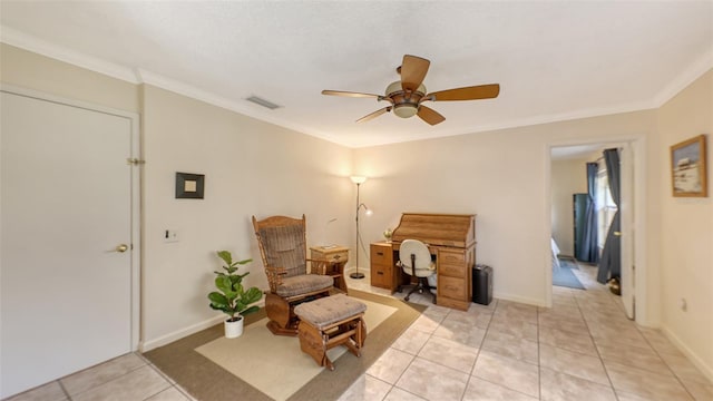 sitting room featuring light tile patterned floors, ceiling fan, and ornamental molding