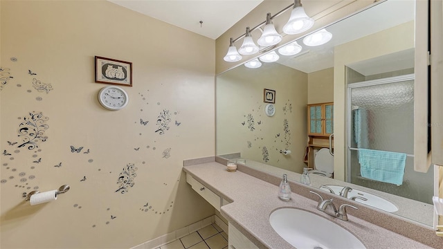 bathroom featuring tile patterned floors and vanity