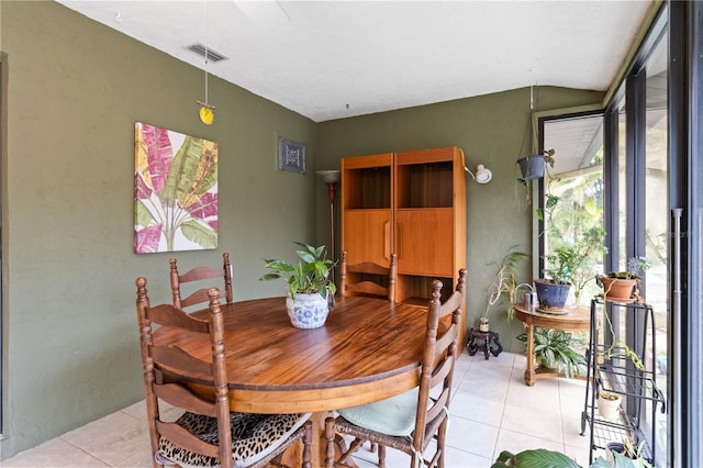 dining room with light tile patterned floors