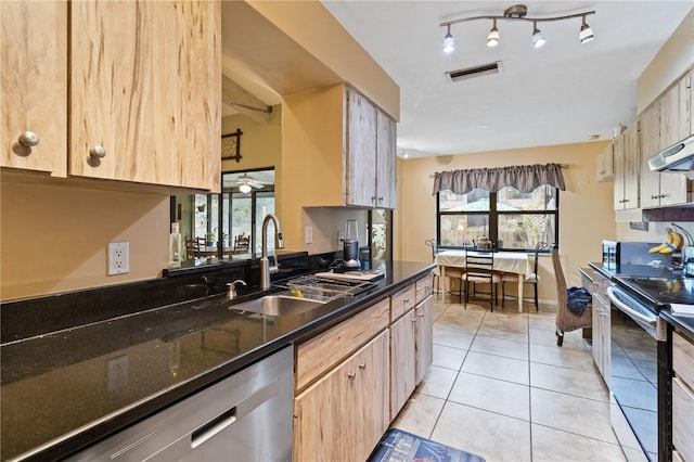 kitchen featuring light brown cabinetry, ventilation hood, stainless steel appliances, sink, and light tile patterned floors