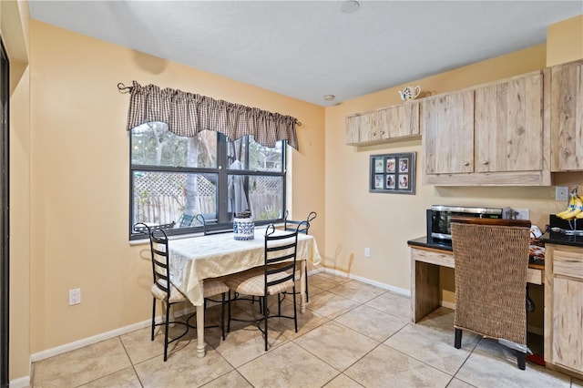 view of tiled dining space