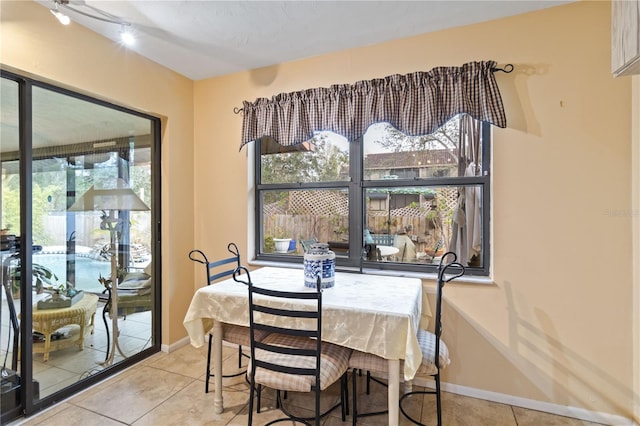 dining room featuring light tile patterned floors