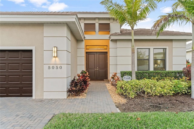 property entrance featuring a garage