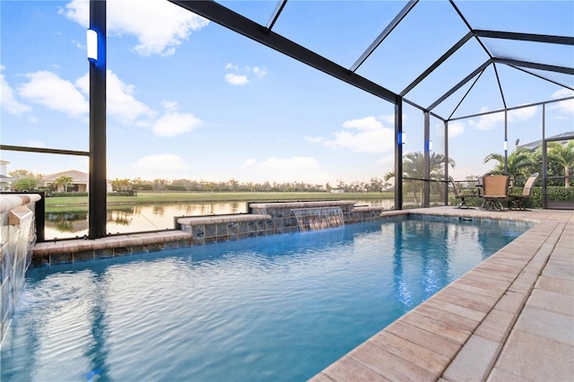 view of pool with a water view, a lanai, pool water feature, and a patio area