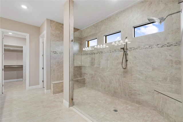 bathroom featuring tiled shower