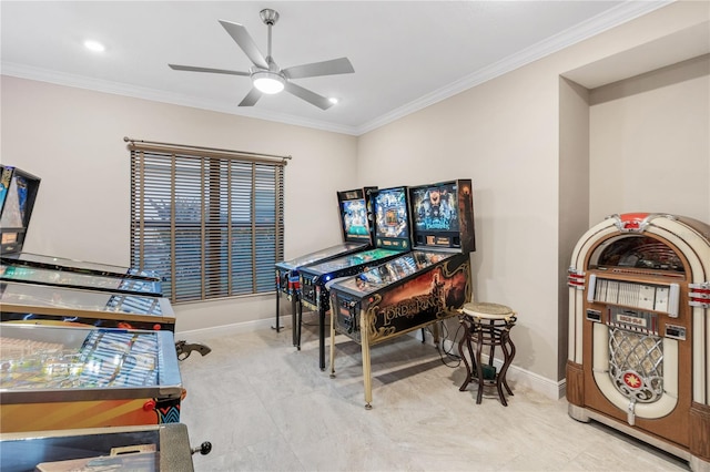 interior space with ceiling fan and ornamental molding