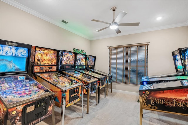 recreation room with crown molding and ceiling fan