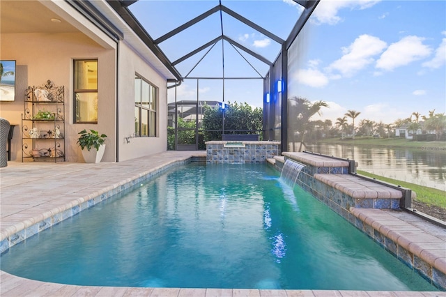 view of swimming pool with an in ground hot tub, a water view, a lanai, and a patio area