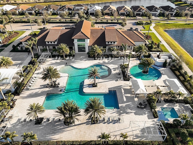 view of swimming pool with a patio area