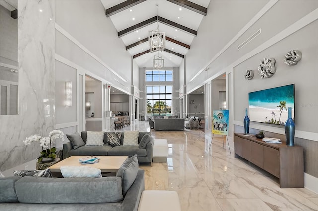 living room with an inviting chandelier, high vaulted ceiling, and beamed ceiling