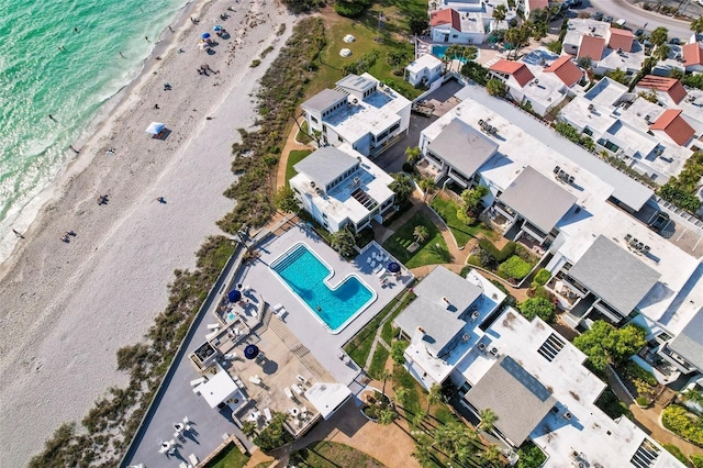 aerial view with a beach view and a water view