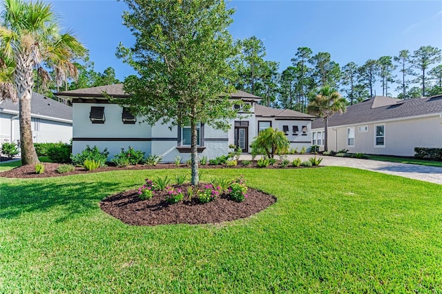 view of front facade with a front lawn