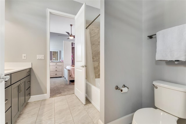 full bathroom featuring vanity, tile patterned flooring, ceiling fan, toilet, and shower / bathtub combination with curtain