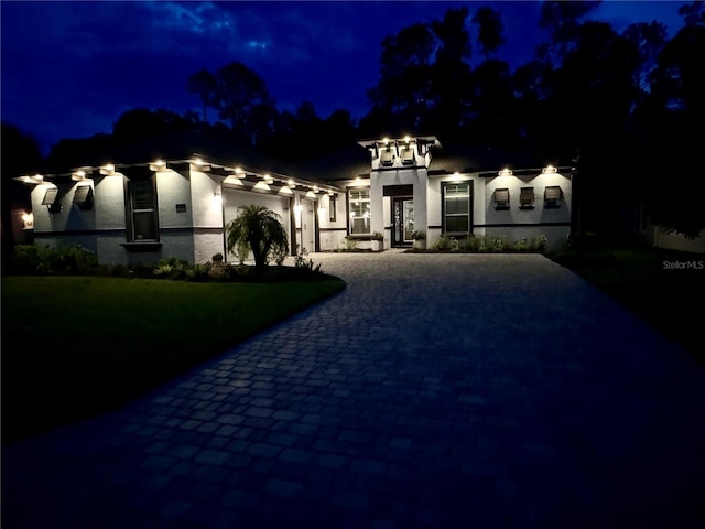 view of front of home with a garage