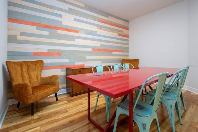 dining area featuring light wood-type flooring