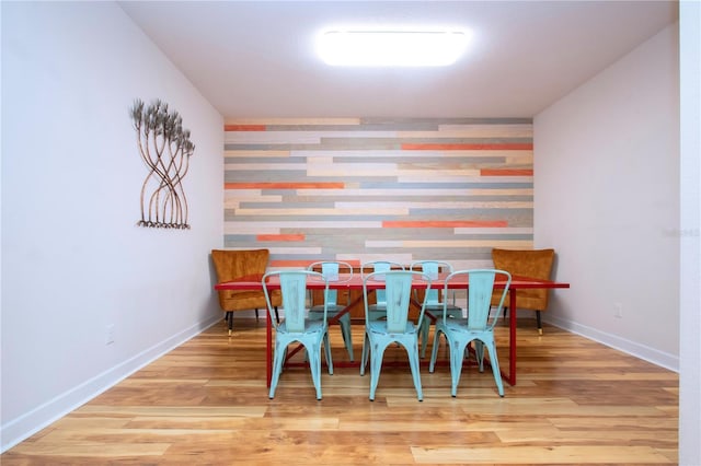 dining room with hardwood / wood-style flooring