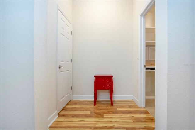 hallway featuring light hardwood / wood-style floors