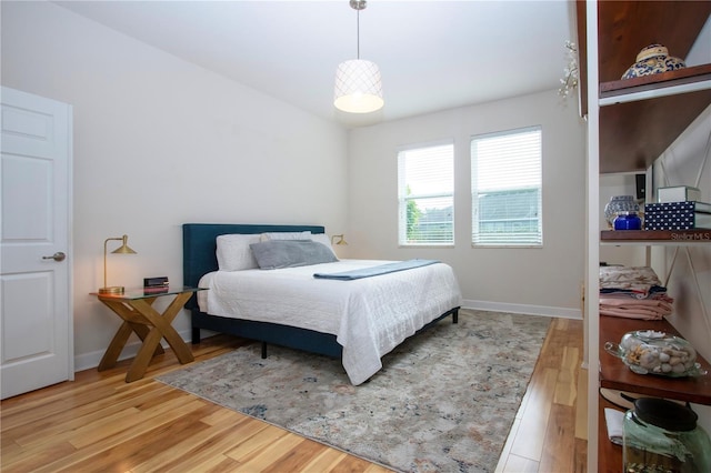 bedroom with light hardwood / wood-style floors