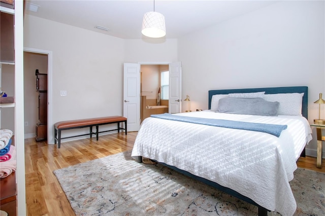 bedroom featuring light hardwood / wood-style floors