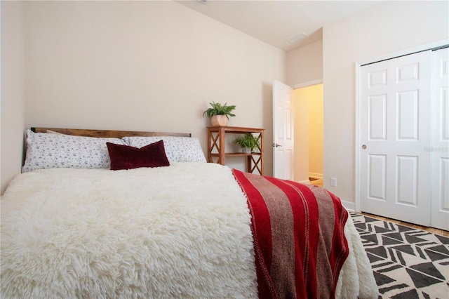 bedroom featuring a closet and hardwood / wood-style floors