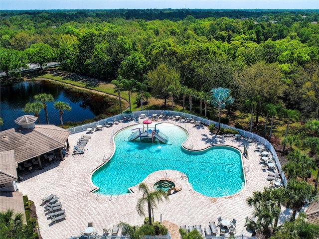 view of swimming pool with a patio area