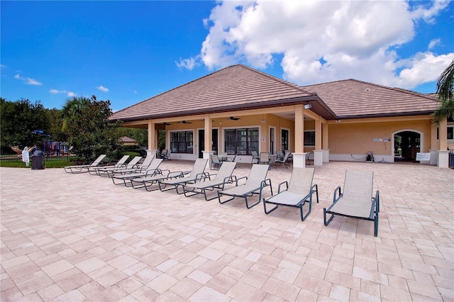 view of patio / terrace featuring ceiling fan