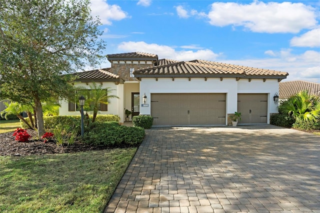 mediterranean / spanish-style house featuring a garage