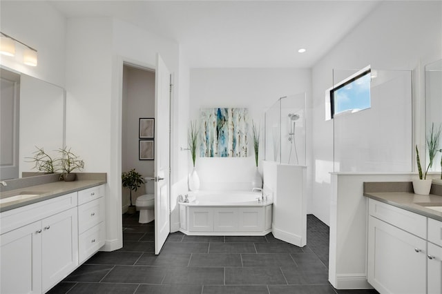 13126 Indigo Way, Bradenton, FL 34211 - full bathroom featuring walk in shower, a garden tub, two vanities, and tile patterned flooring
