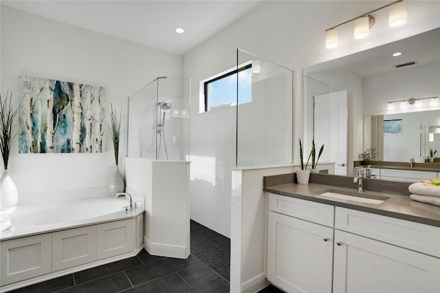 13126 Indigo Way, Bradenton, FL 34211 - full bath with a walk in shower, vanity, a garden tub, and tile patterned floors