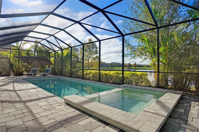 13126 Indigo Way, Bradenton, FL 34211 - view of swimming pool featuring a water view, a pool with connected hot tub, a patio, and a lanai