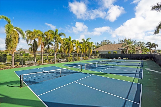 view of tennis court featuring basketball court