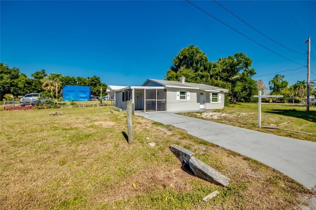 ranch-style house with a front yard