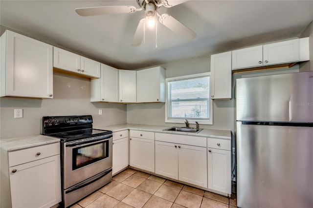 kitchen with white cabinetry, sink, and stainless steel appliances